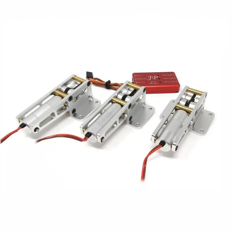 Three electric motors with wires attached to them.