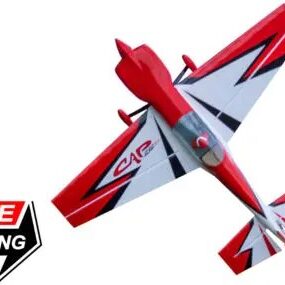 A red and white plane is flying in the air