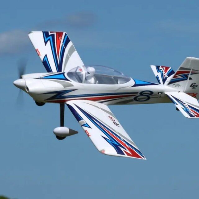 A small airplane flying in the sky with its landing gear down.