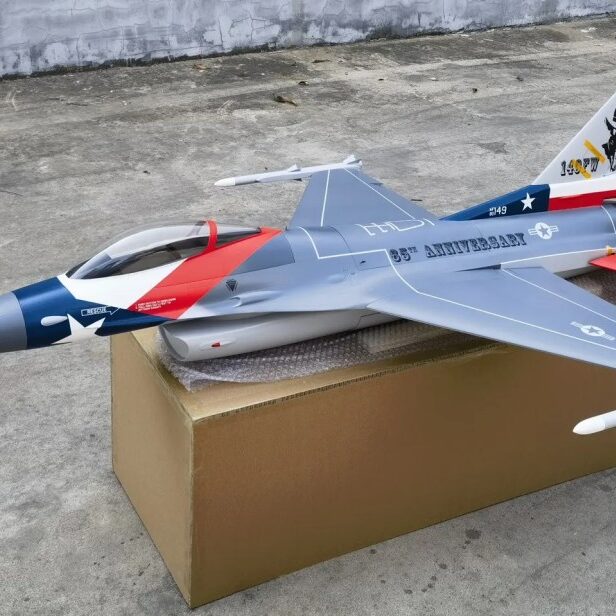 A model of an airplane sitting on top of a box.