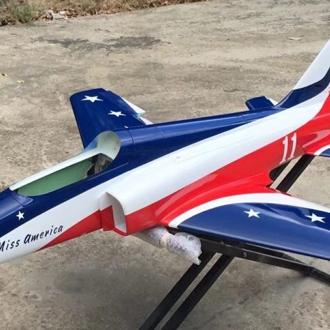 A red white and blue jet plane on display.
