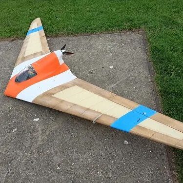 A small plane is sitting on the ground.