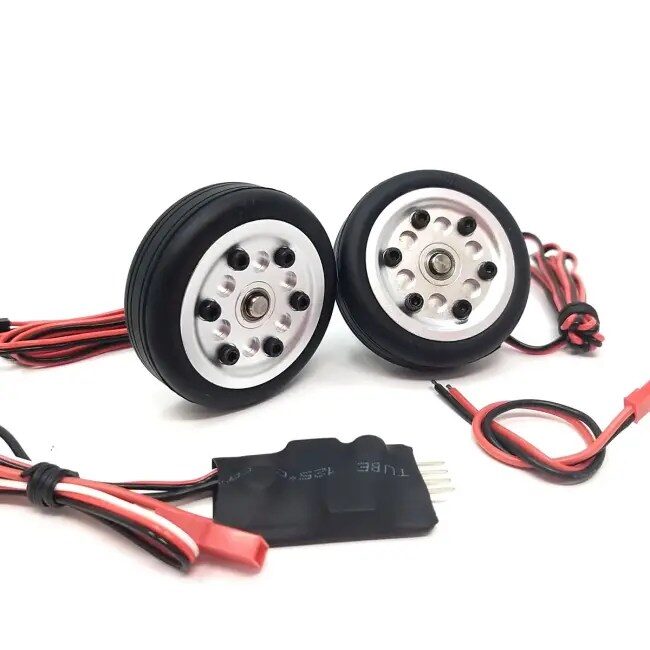 A pair of wheels with wires attached to them.