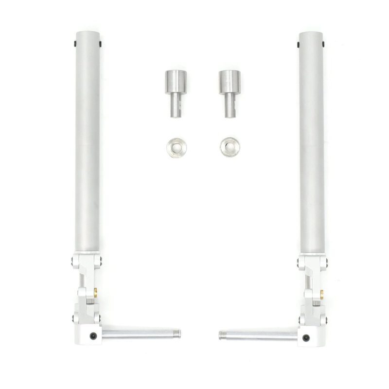 A pair of white metal handles and two other parts.