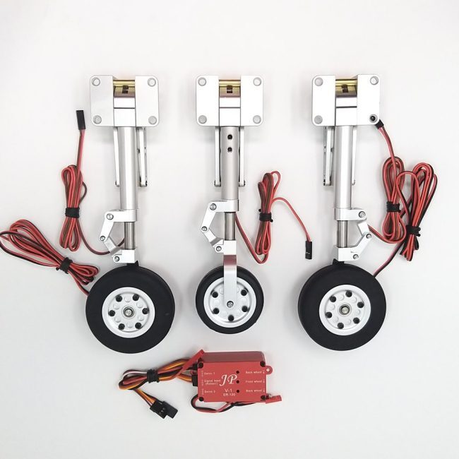 Three small wheels with a red wire on them.