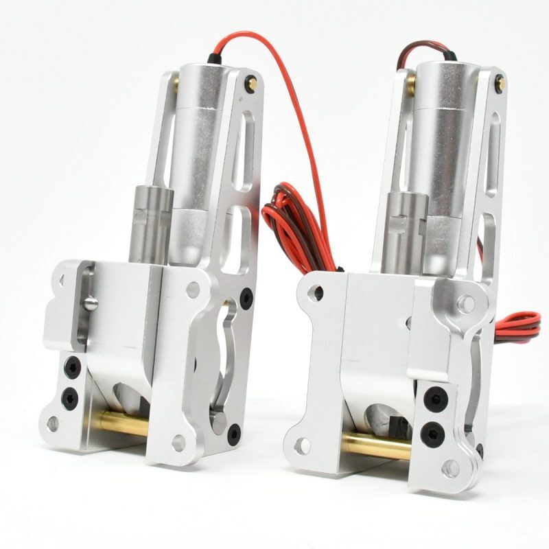 A pair of electric motors attached to the side of a machine.
